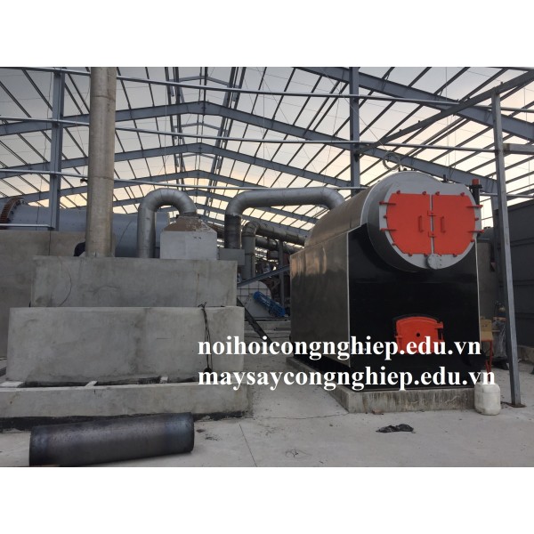 Firewood and rice husk fired boiler