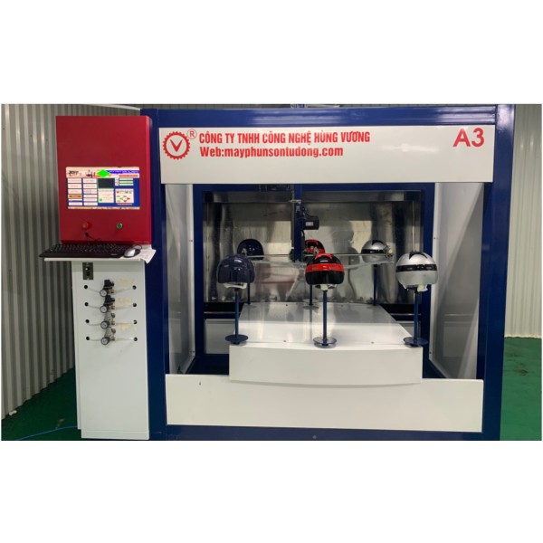 Helmet painting machine